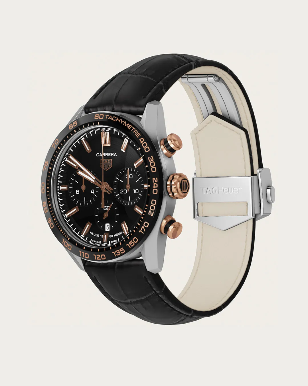 TAG Heuer Carrera chronograph watch with black dial, rose gold accents, and leather strap