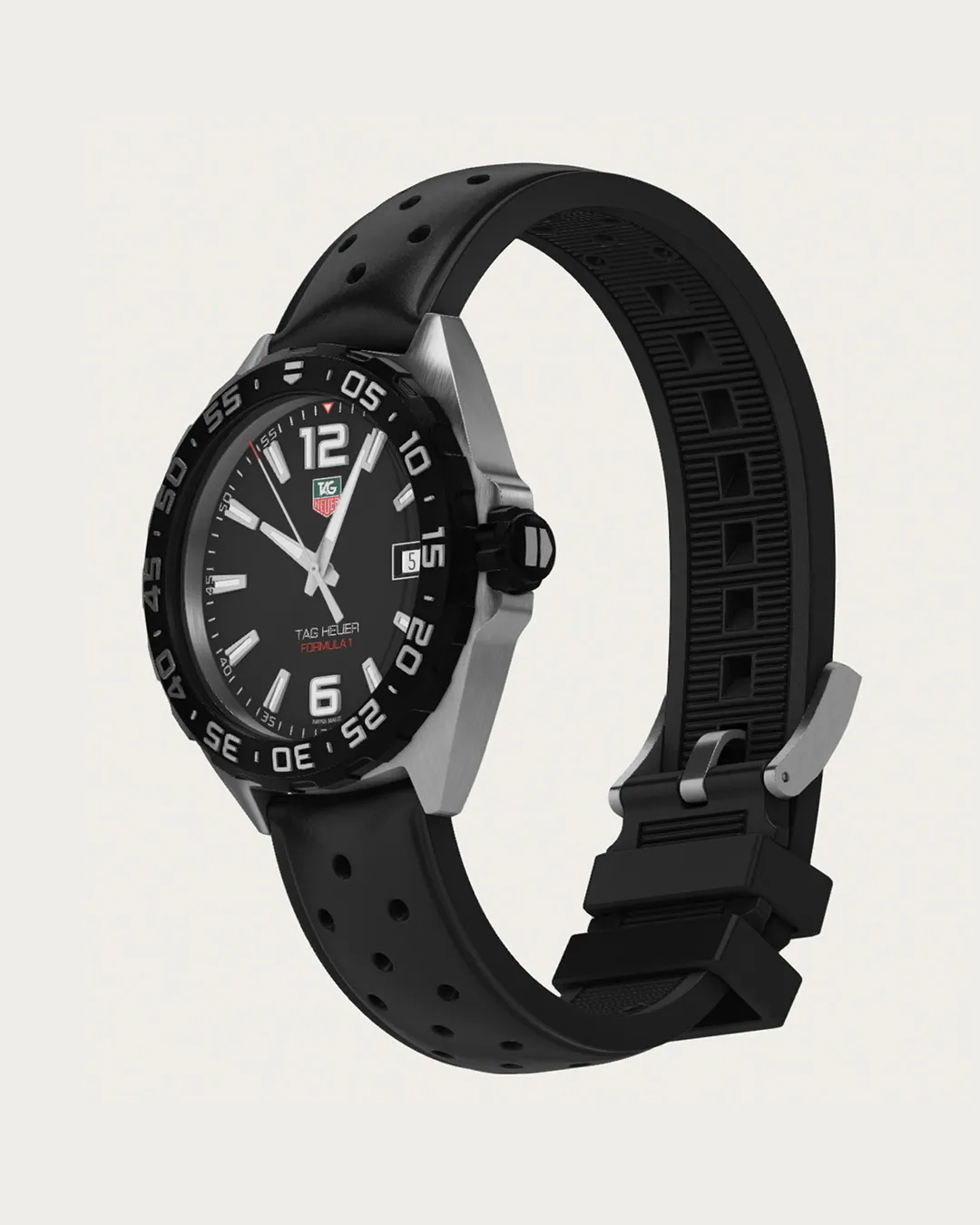 TAG Heuer Formula 1 watch with black dial and black rubber strap displayed at angle